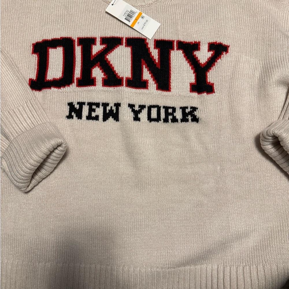NWT DKNY Sweater 
Black letters with red trim 
Size S